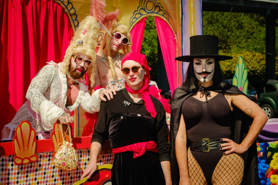 A group of costumed individuals pose for the camera