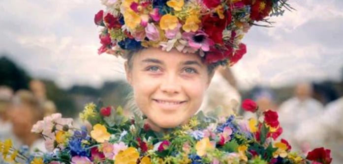 A scene from Midsommar showing Florence Pugh wearing a lot of flowers