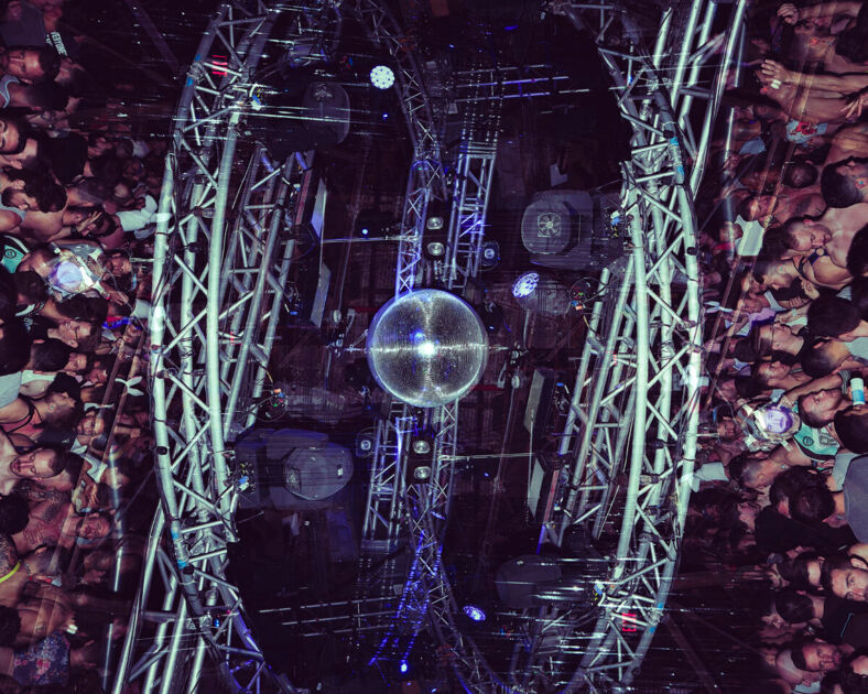 A shot looking up at the ceiling of Mother Disco with crowds reflected on both sides