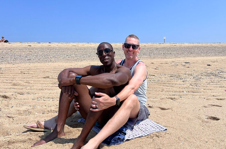 The author (right) and his husband at Herring Cove beach