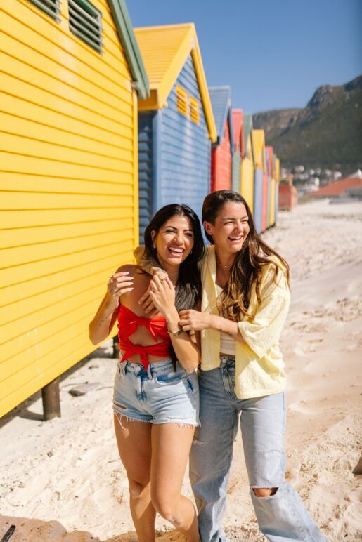 Christine Diaz, left and Kirstie Pike at Muizenberg Beach, Cape Town, South Africa