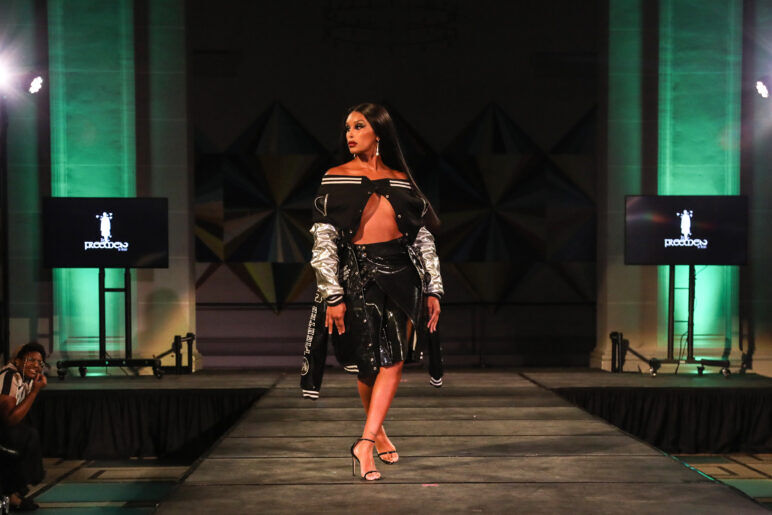 A model wears an outfit from FreeMen by Mickey at the dapperQ fasion show during New York Fashion Week
