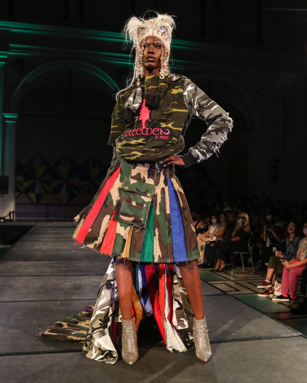 A model wears an outfit from FreeMen by Mickey at the dapperQ fasion show during New York Fashion Week