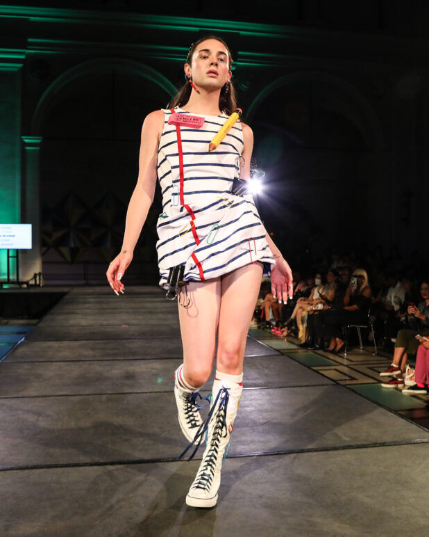 A model wears an outfit from Zoe Grinfeld at the dapperQ fashion show during New York Fashion Week