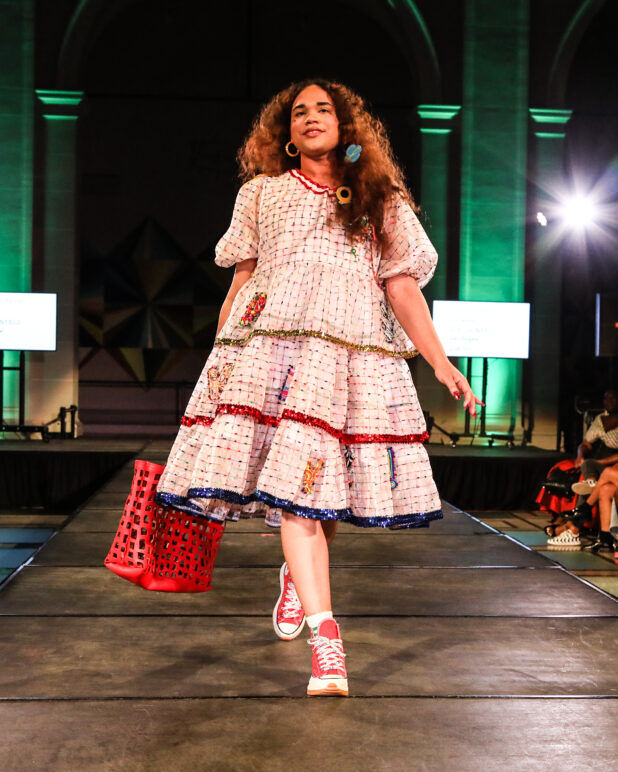 A model wears an outfit from Zoe Grinfeld at the dapperQ fashion show during New York Fashion Week