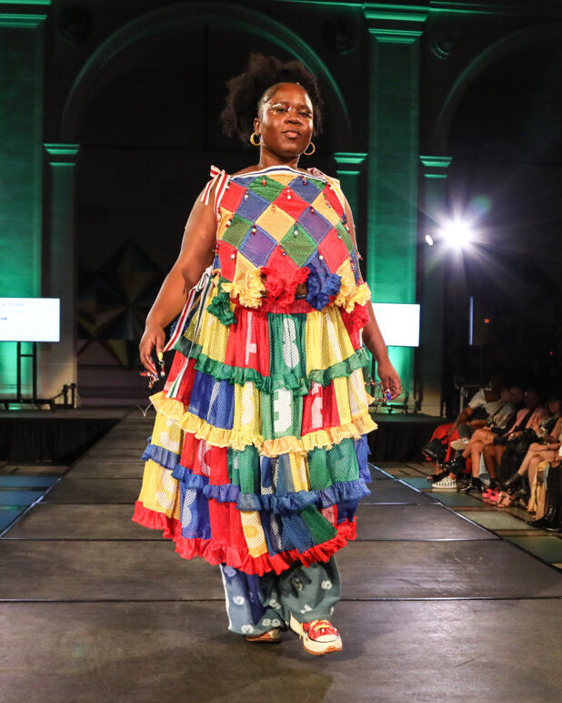 A model wears an outfit from Zoe Grinfeld at the dapperQ fashion show during New York Fashion Week