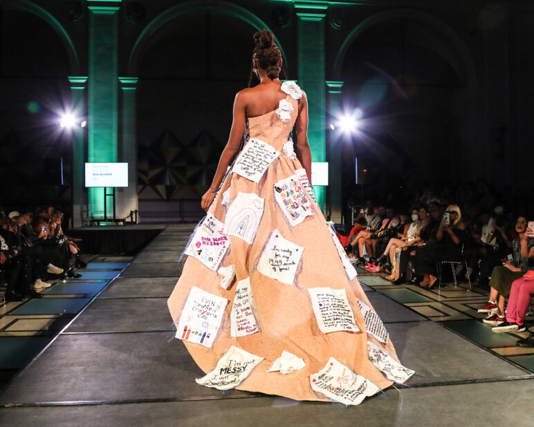 A model wears an outfit from Zoe Grinfeld at the dapperQ fashion show during New York Fashion Week