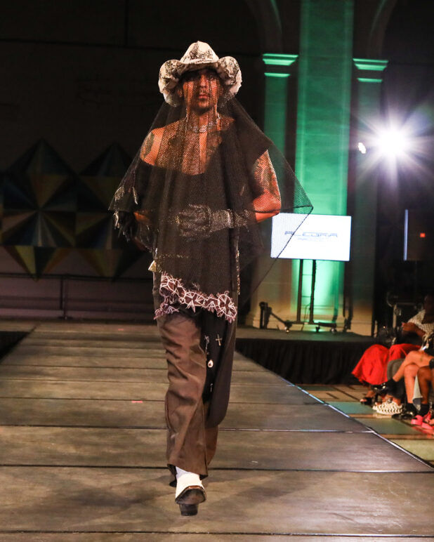 A model wears an outfit from ALEGRÍA at the dapperQ fashion show during New York Fashion Week