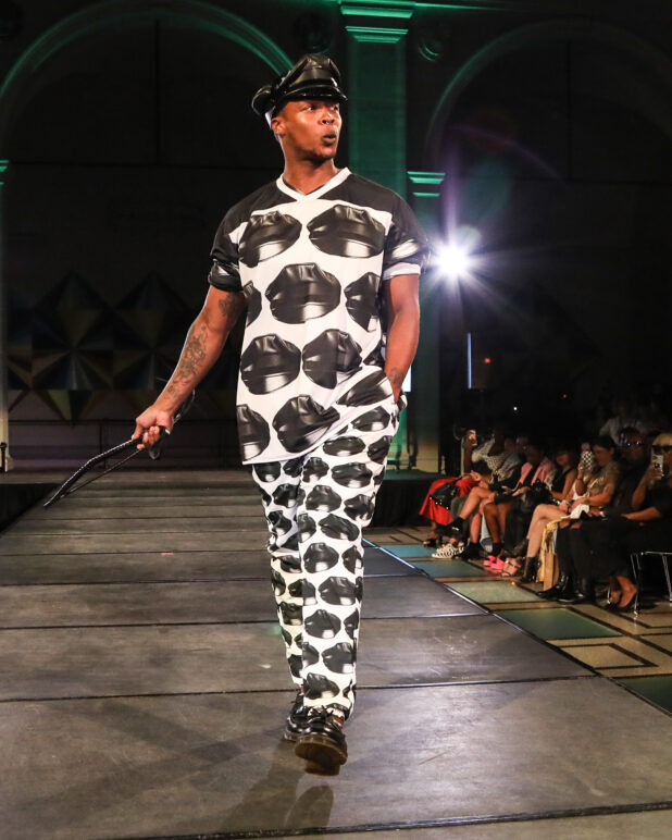 A model wears an outfit from Transguy Supply at the dapperQ fashion show during New York Fashion Week