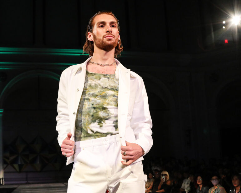 A model wears an outfit from KEITH KELLY at the dapperQ fashion show during New York Fashion Week