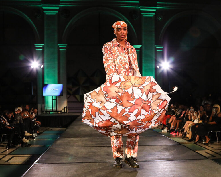 A model wears an outfit from KEITH KELLY at the dapperQ fashion show during New York Fashion Week