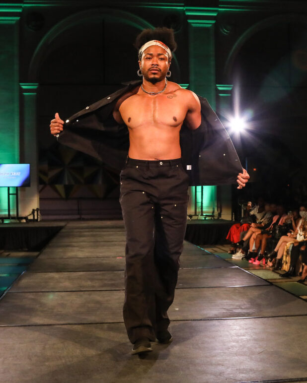 A model wears an outfit from KEITH KELLY at the dapperQ fashion show during New York Fashion Week