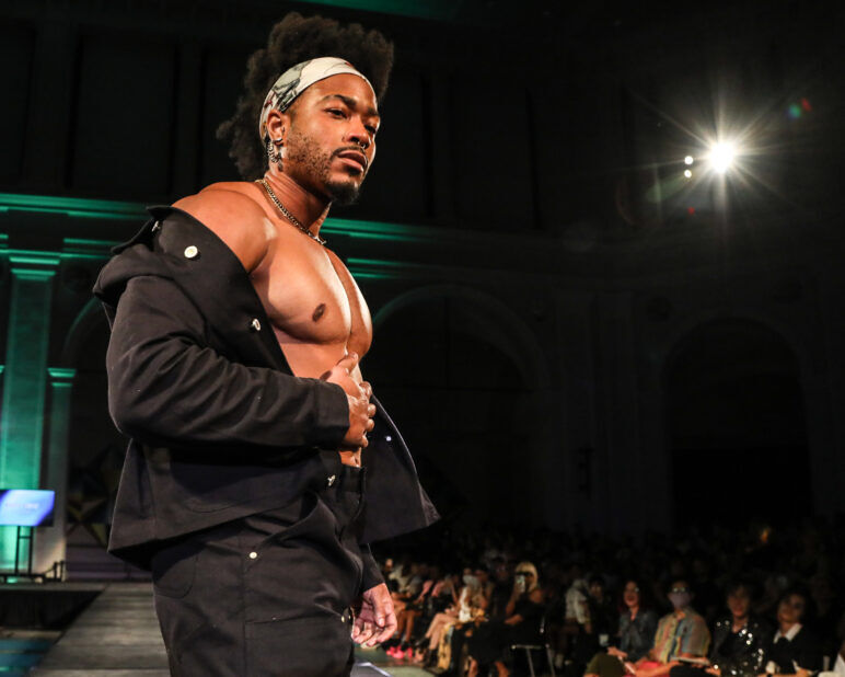 A model wears an outfit from KEITH KELLY at the dapperQ fashion show during New York Fashion Week