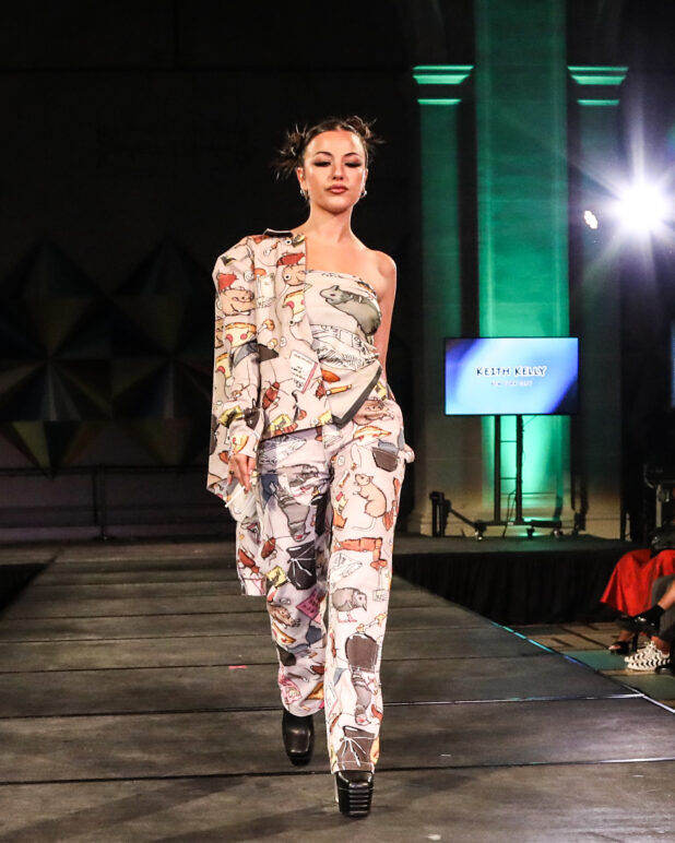 A model wears an outfit from KEITH KELLY at the dapperQ fashion show during New York Fashion Week