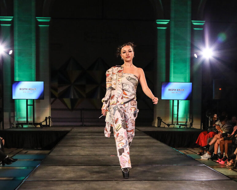 A model wears an outfit from KEITH KELLY at the dapperQ fashion show during New York Fashion Week