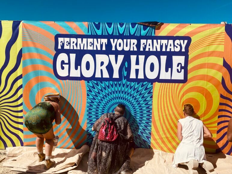 The Fermented Realities camp offers a PG-13 twist on the traditional Glory Hole. Guests must choose between "Salty" or "Sweet." Salty results in a pickle inserted into the mouth, while sweet gets you a maple syrup-drenched dildo.
