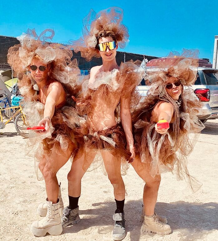 Romano, Poodle, and Yazz, members of the queer camp Glamcocks, flaunting their matching tutu ensembles for this year's Tutu Tuesday.