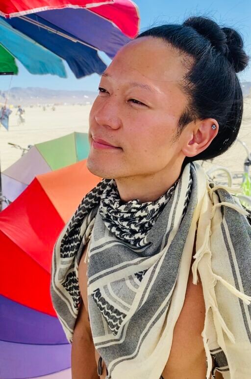 Patrick aka Northstar, enjoying a moment of peace on playa.