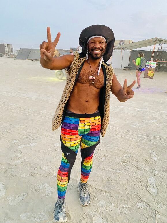 Tre, an SF-based Glamcock, flashing peace signs on his way to the Man Burn.