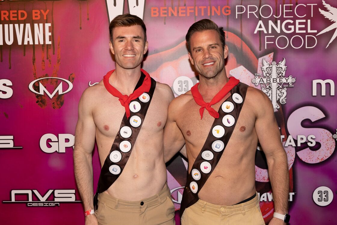 Gay shirtless couple in Boy Scout outfits