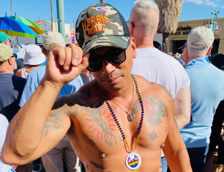 Muscle dude with Kamala Hat