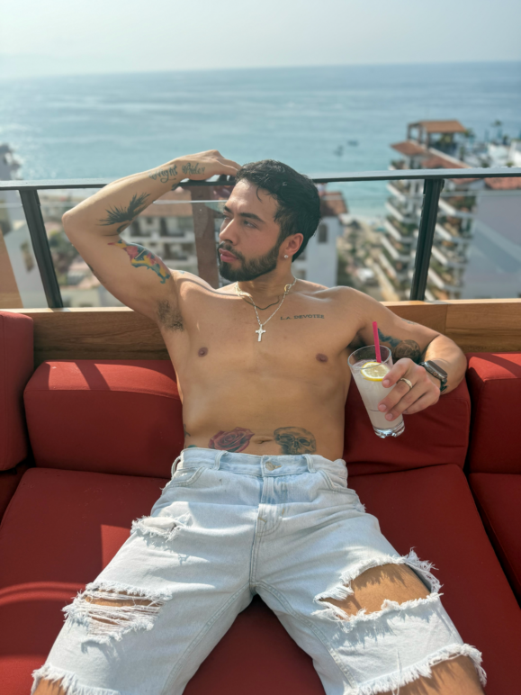 Amaya poses poolside