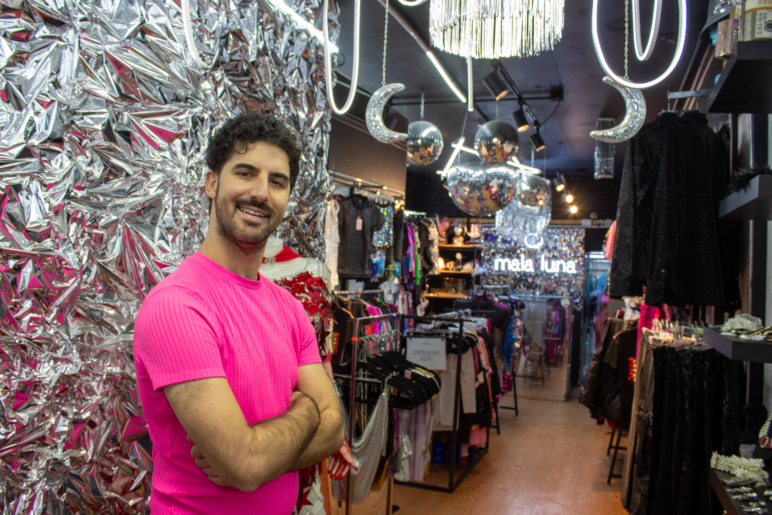 Chapu Garza stands in the doorway of Mala Luna