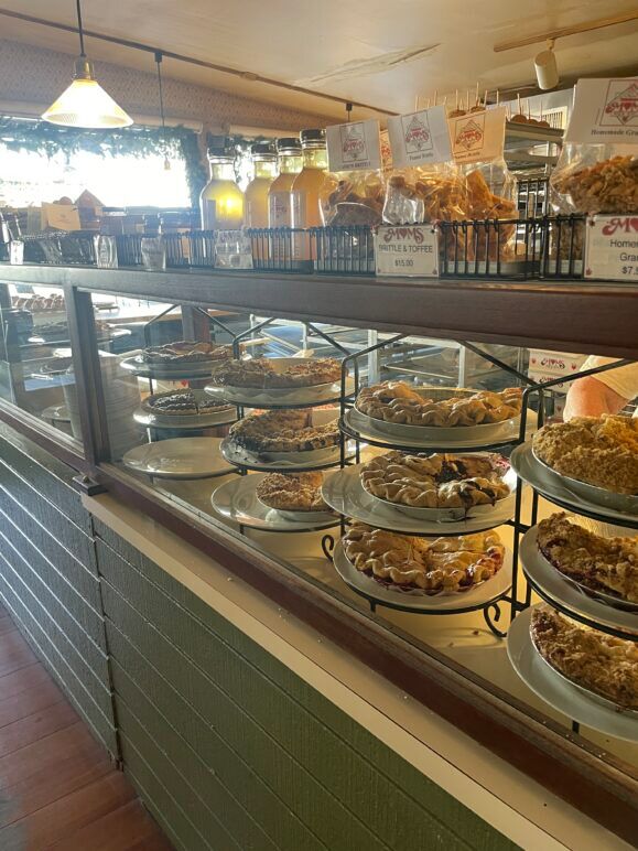 A selection of pies in a glass case in Mom's Pies