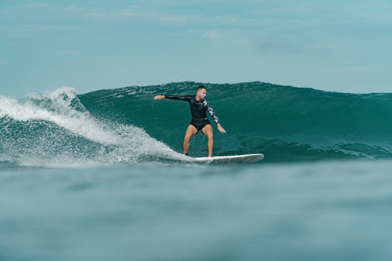 Joe Santini surfing a wave. 