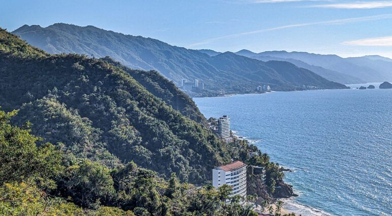Banderas Bay with tree covered mountains surrounding it