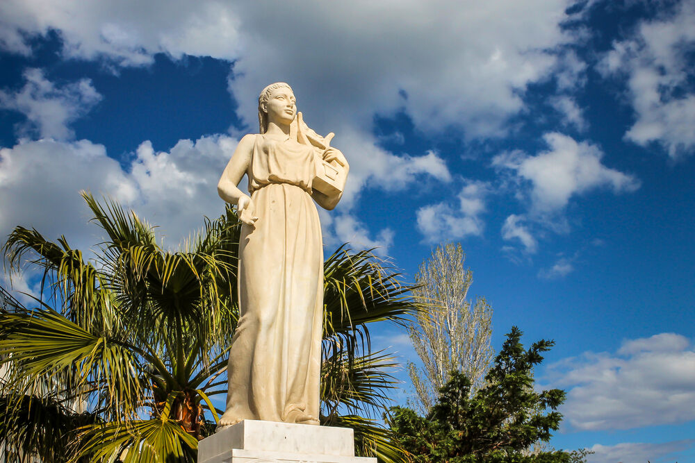 Statue of the ancient lyric poet Sappho, in the Sappho square, in the city of Mytilene, Greece.