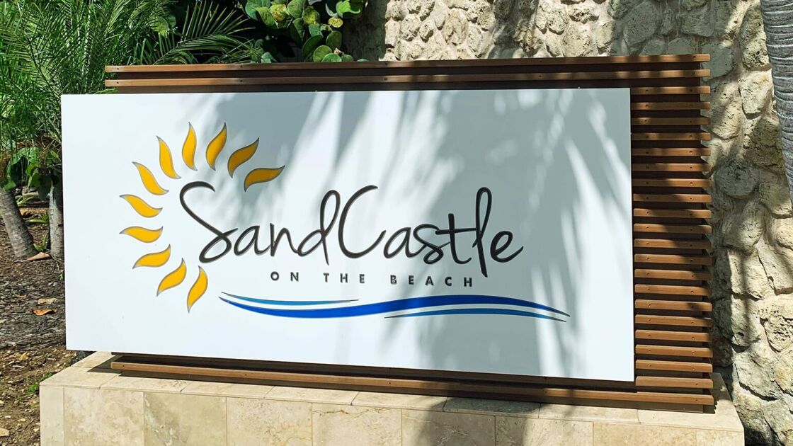 The front door signage for St. Croix hotel Sand Castle on the Beach.