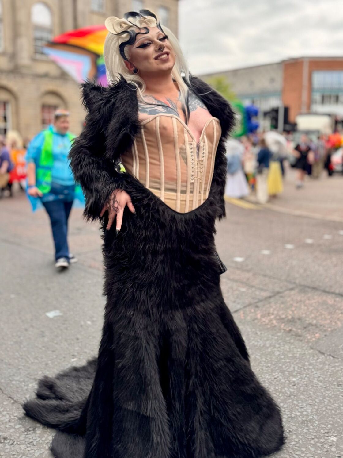drag queen in corset and fur