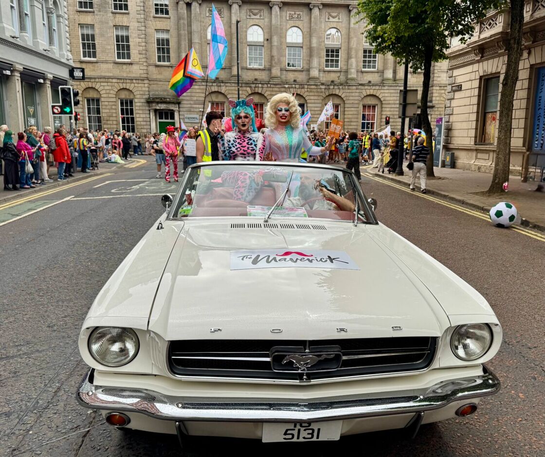drag queens in a car for the Belfast Pride parade