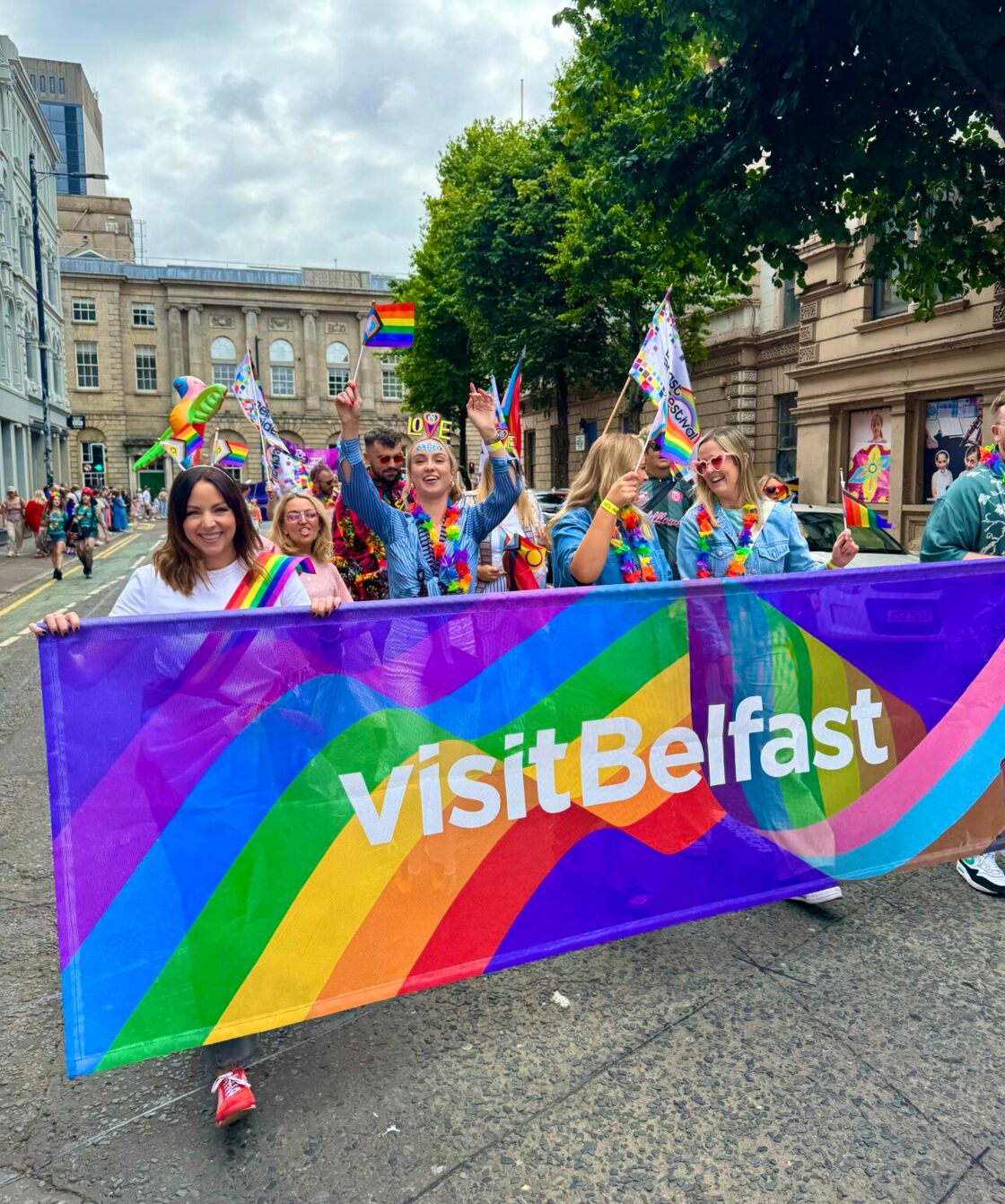 Visit Belfast, the tourism representatives for Belfast, Northern Ireland march in the Pride parade