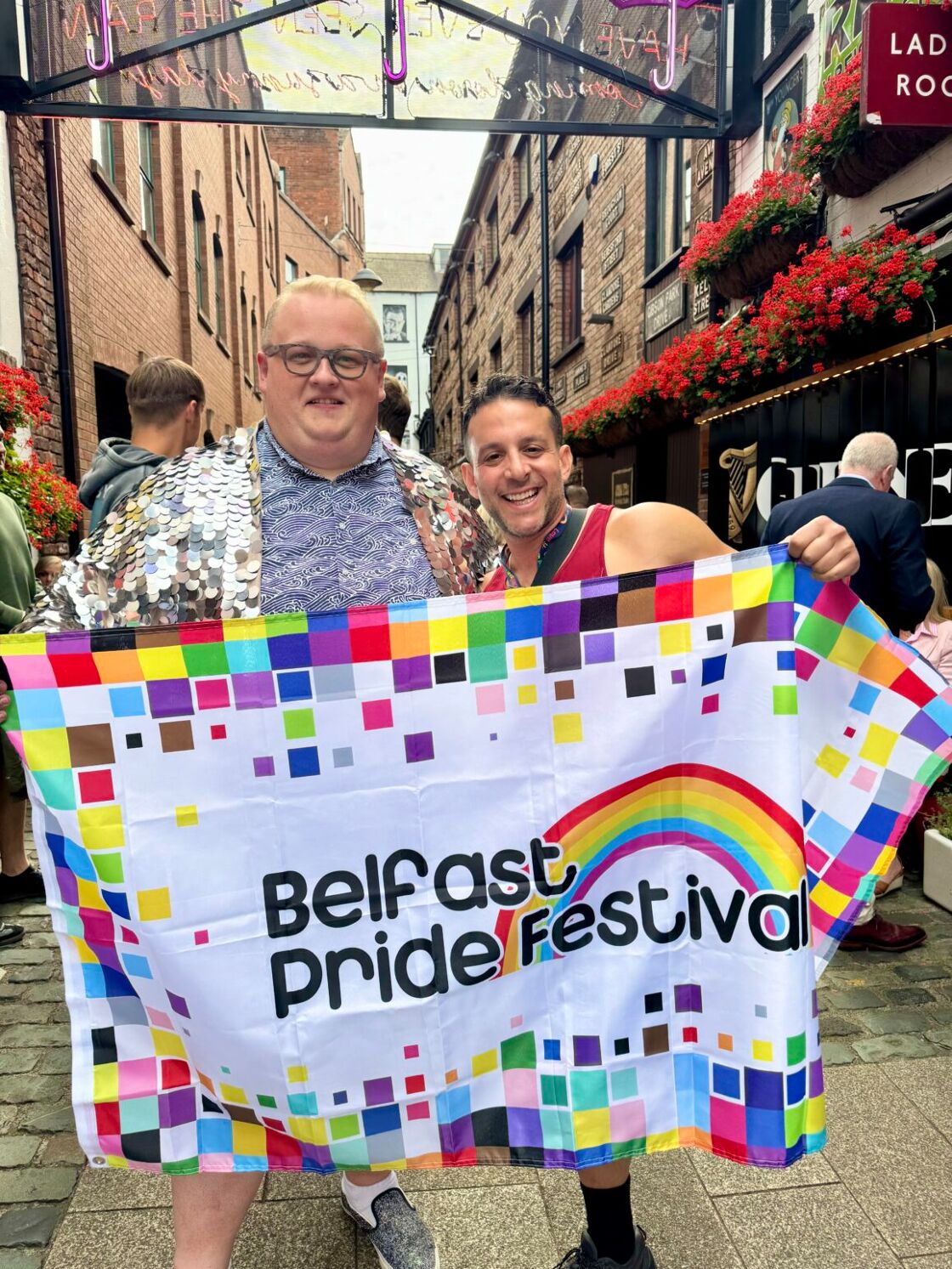Belfast city councilor attends Belfast Pride Festival with travel writer Ivan Quintanilla