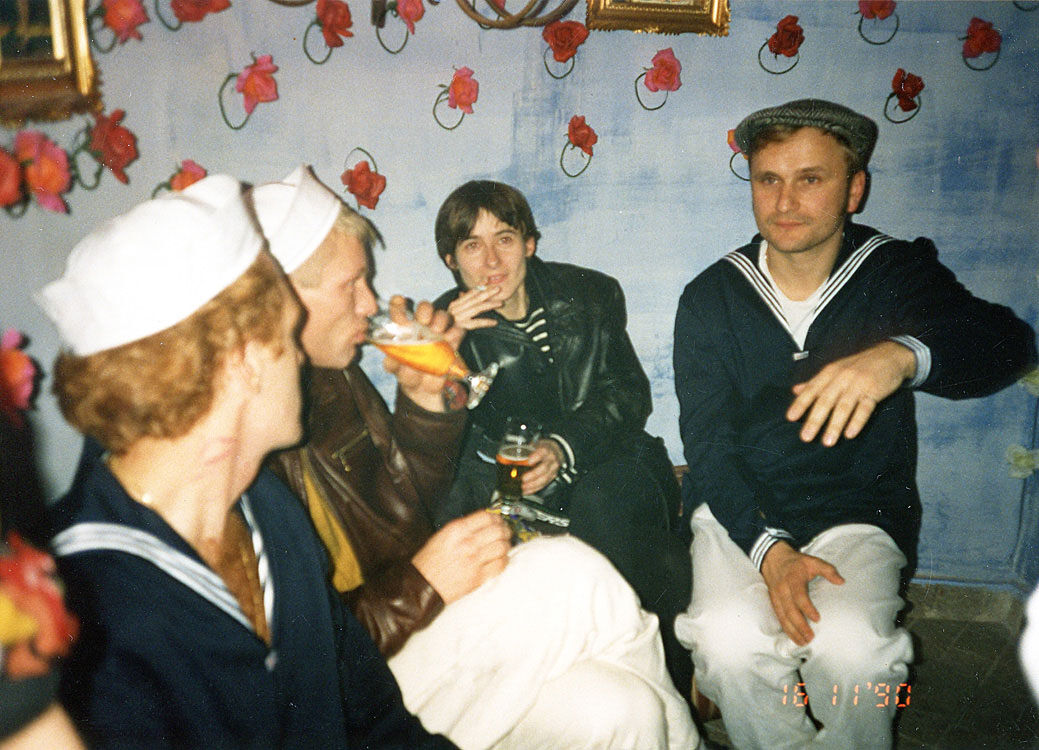A 90's historic photo of navy men sitting in the corner of Berlin's gay bar, Hafen.