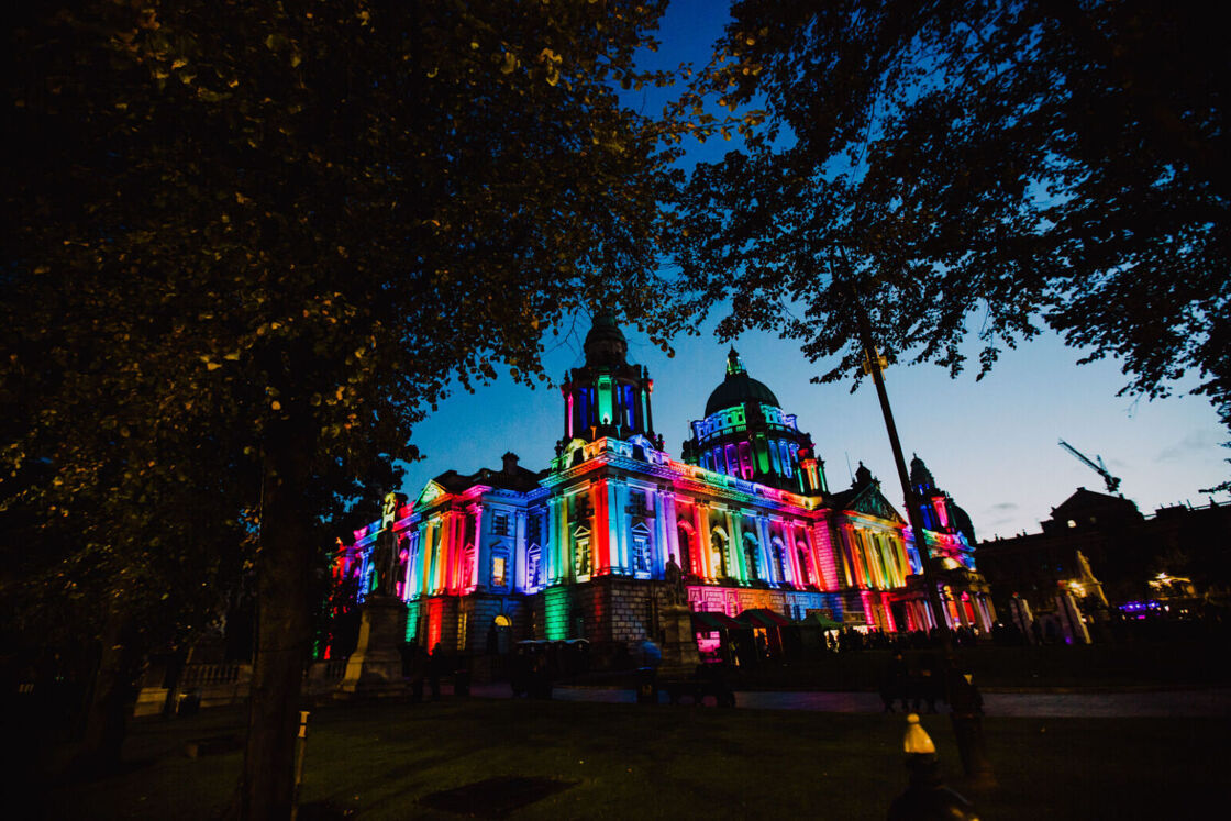 Belfast City Hall lit in colors of the rainbow for Pride