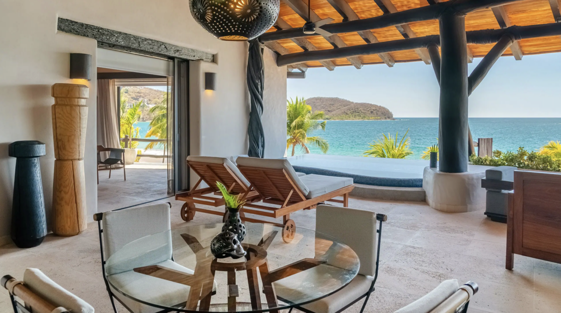 A beachfront patio attached to a suite at Thompson Zihuatanejo. 