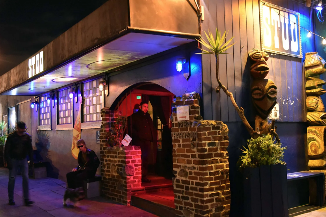 The exterior of The Stud's longtime location on Harrison Street, pictured at night.