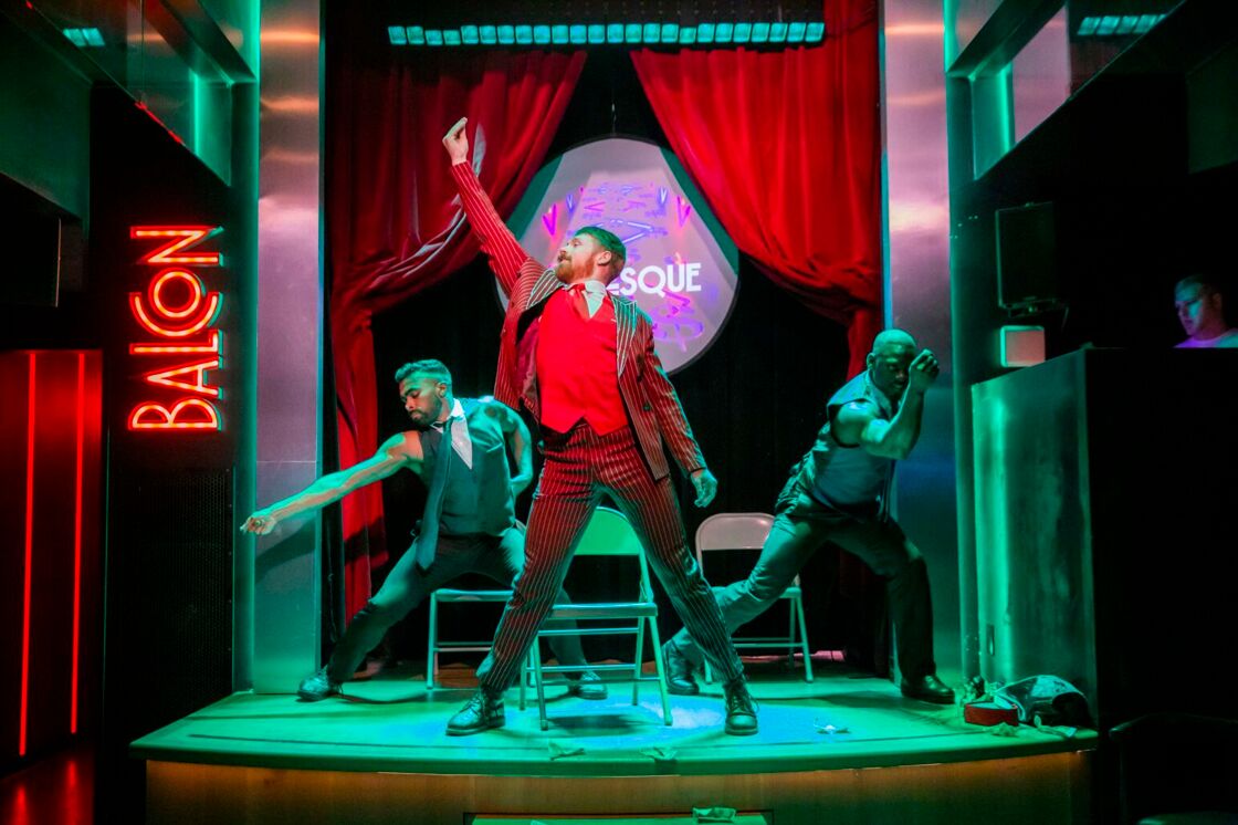 Three men performing in various states of disrobe at Boylesque at Balcon Salon.