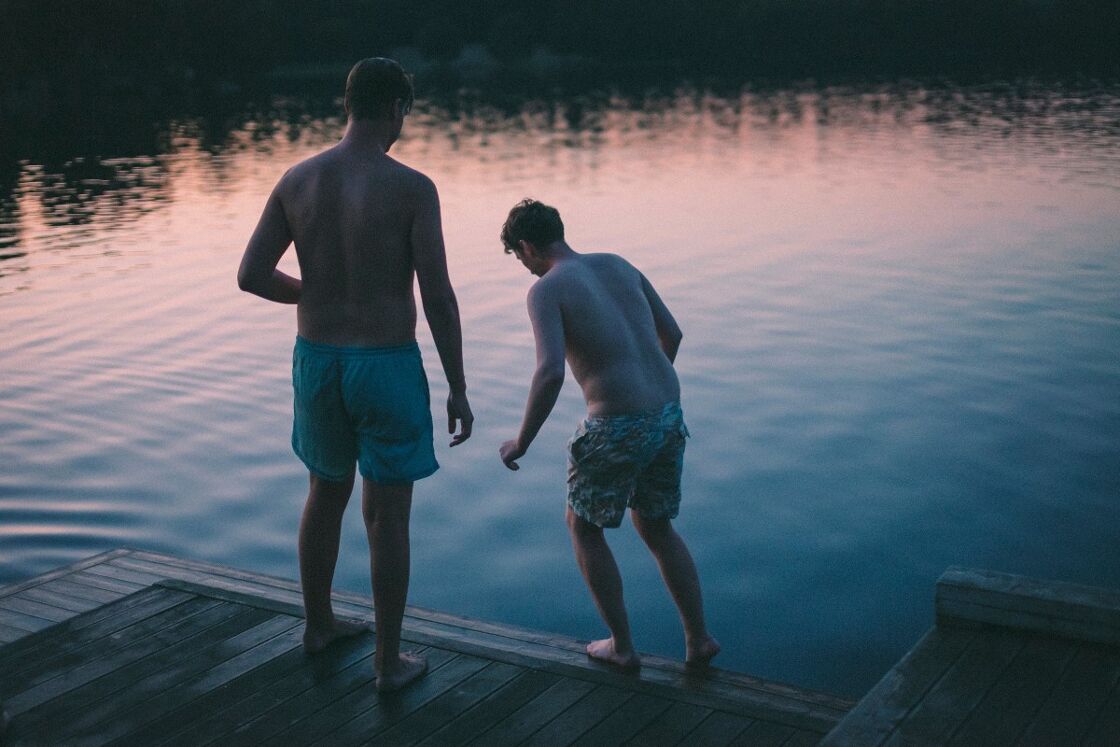 Two men on a pier in Stockhol, Sweden