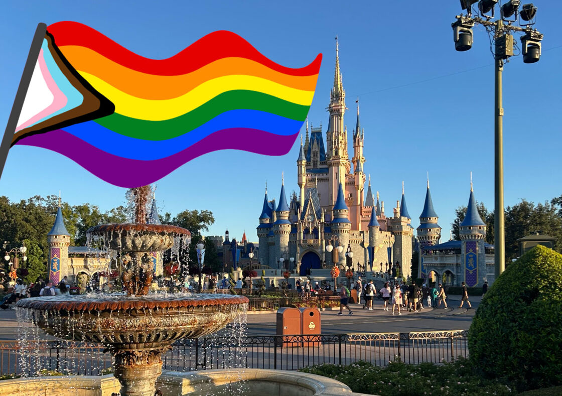 Disney World's Magic Kingdom is pictured in the morning with an animated Pride flag superimposed in the corner.