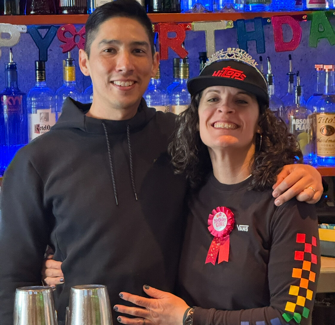 Romero behind the bar at Hi Tops in the Castro.