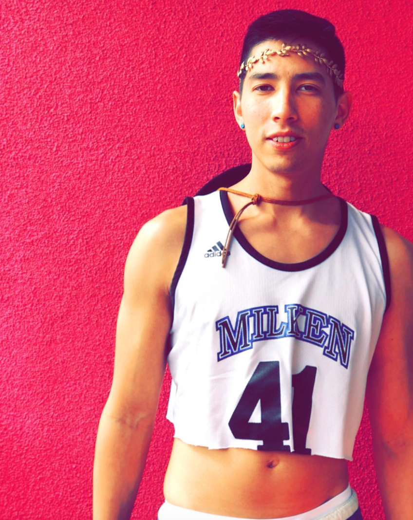 Basketball fan Romero shows off some serious midriff.