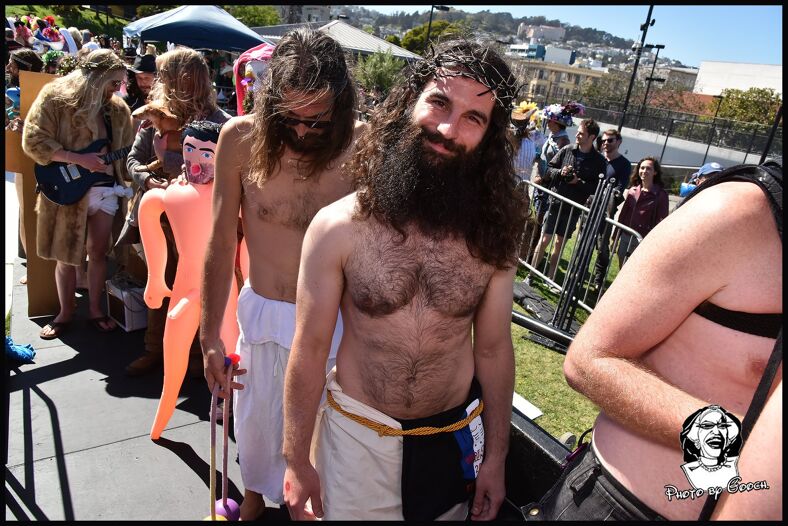 Contestants line up for the Hunky Jesus costume contest.