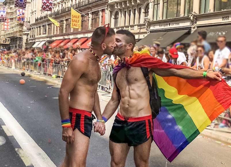 The nomadic boys kiss on the street during London Pride
