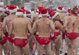 PHOTOS: Canadians Freeze Their Jingle Balls In Snowy Speedo Run